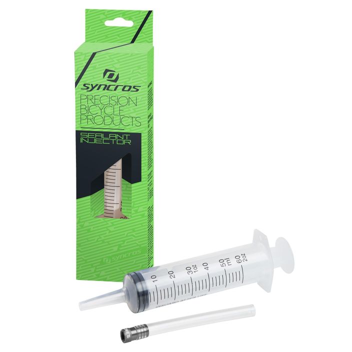 SYNCROS TUBELESS-RUISKU Syncros tubeless sealant injector, tubeless-ruisku. Poista venttiilin sielu ja suihkauta litkut